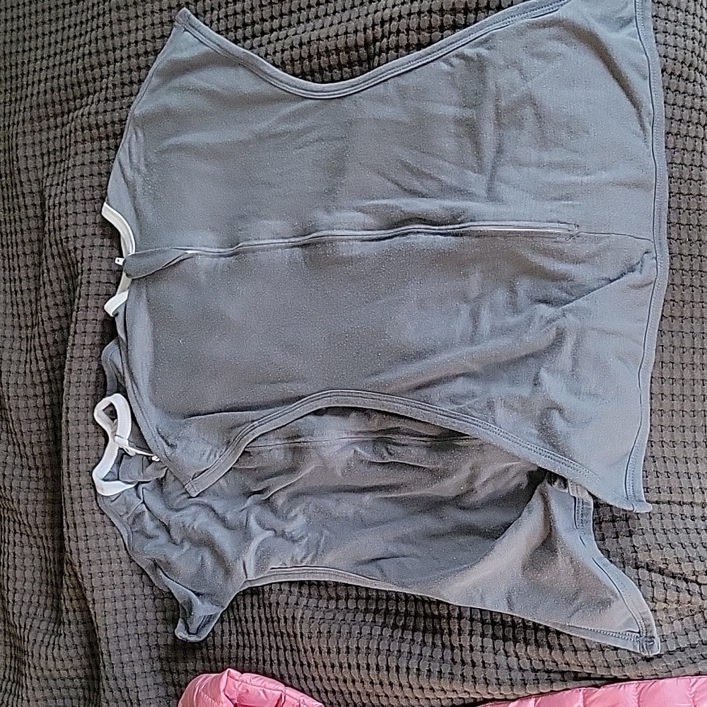 Two gray zipadee sacks